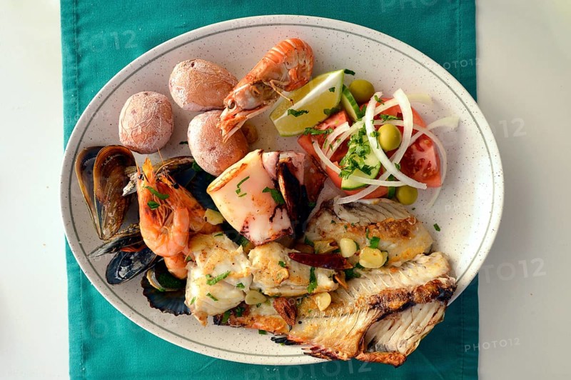 Typical fish dish with shrimps