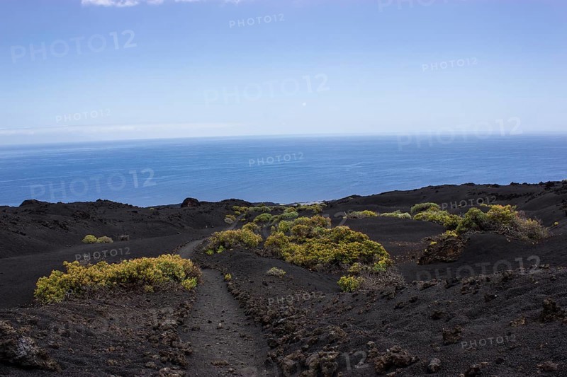 Hiking trail through lava landscape