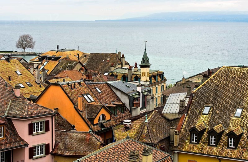 View from the castle over the rooftops of Nyon of Lake Geneva