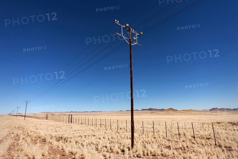 Landscape with electricity and telephone poles along the B4