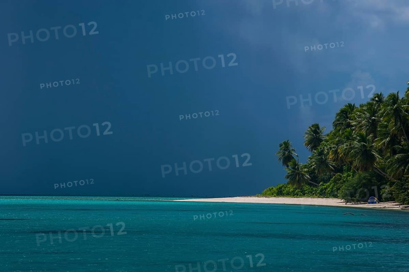 Dark rain clouds above the Ant Atoll