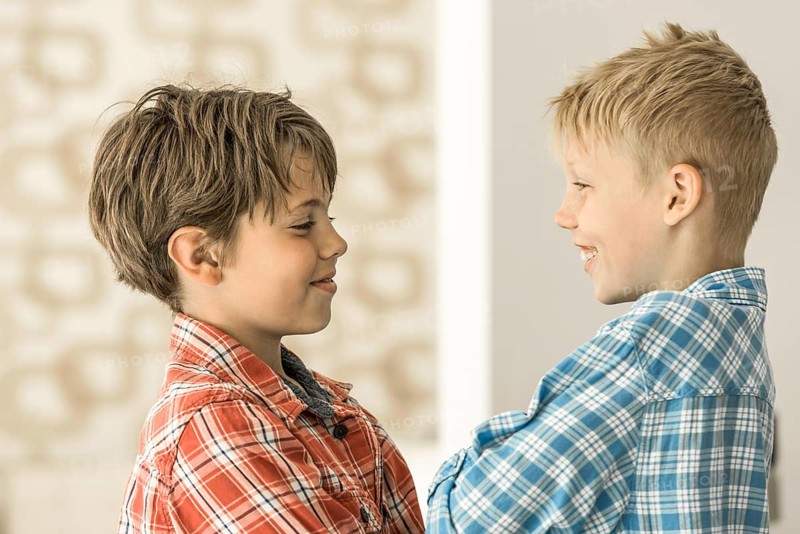 Two boys in plaid shirts