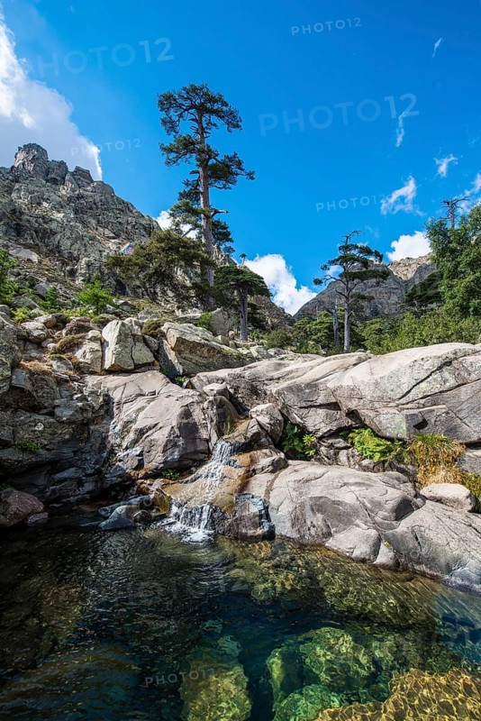 Pool and small waterfall in the mountains