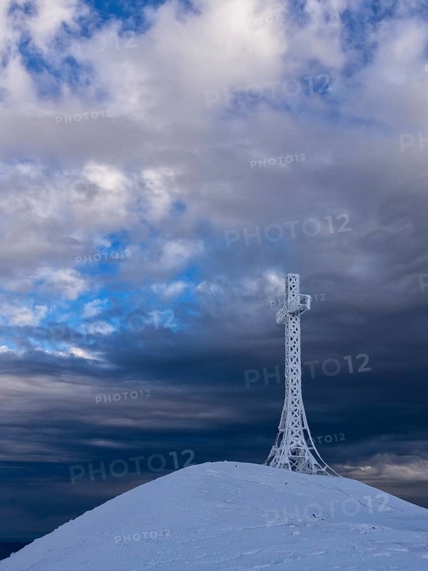 Summit cross covered with hoarfrost