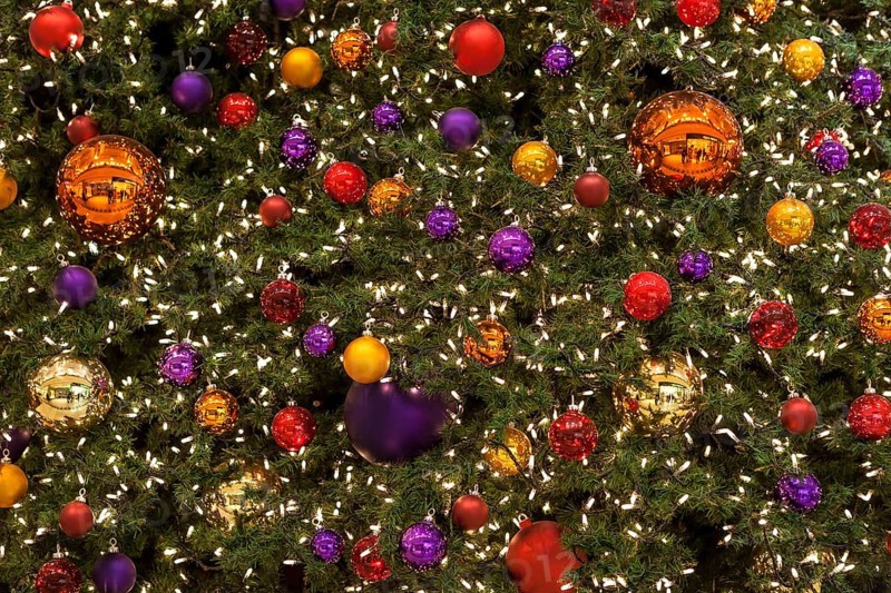 Colourful Christmas baubles and fairy lights