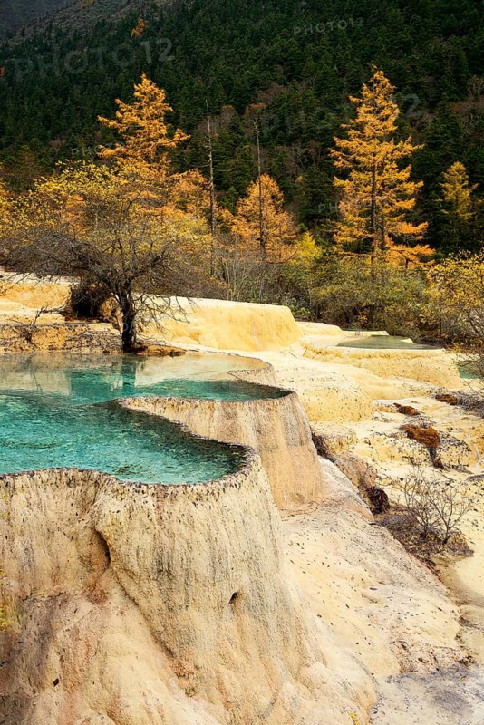 Lime terraces with lakes in autumnal environment