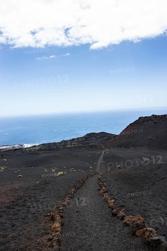 Hiking trail through lava landscape