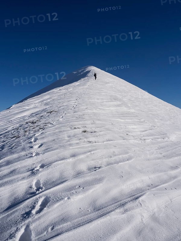 Alpinist climbing Mount Motette