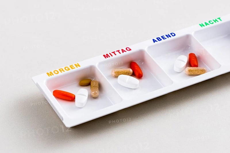 Tablet dispenser filled with pills for the whole day