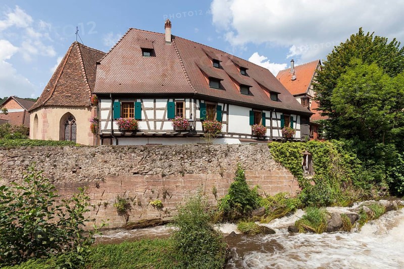 Oberhof Chapel and half-timbered houses on the river Weiss