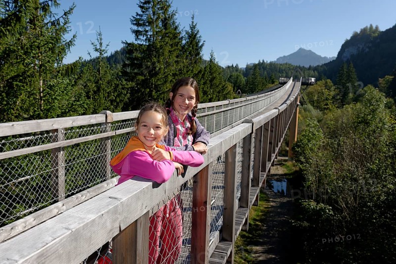 Two girls on the treetop walk