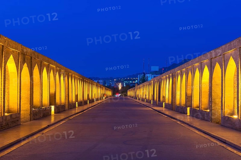 Illuminated Si-o-se Pol Bridge or Allah-Verdi Khan Bridge at dusk