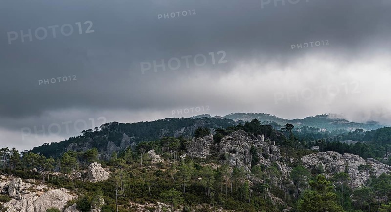 Mountain landscape with dramatic clouds