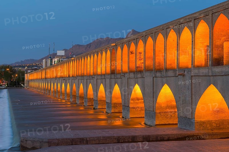 Illuminated Si-o-se Pol Bridge or Allah-Verdi Khan Bridge at dusk
