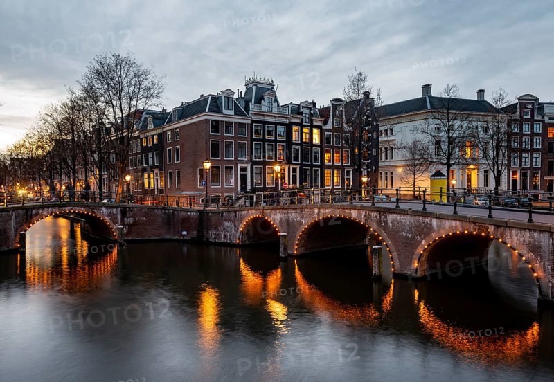 Canal with bridge at dusk