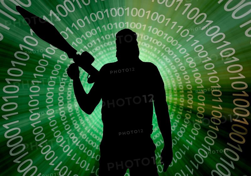 Terrorist in front of digital code