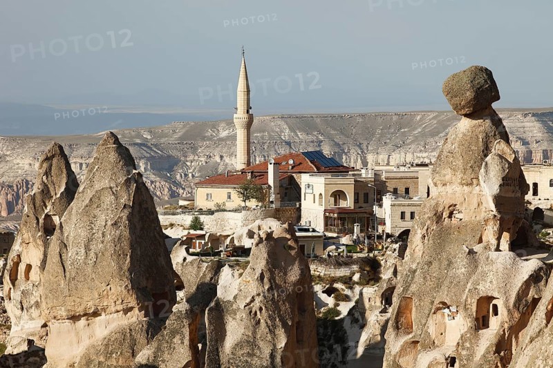 Mosque of Uchisar between cave dwellings and tufa formations