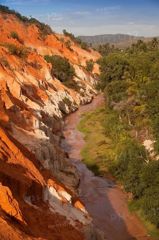 Red sandstone formations of the canyon on Fairy Stream
