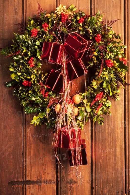 Holly wreath with red packets