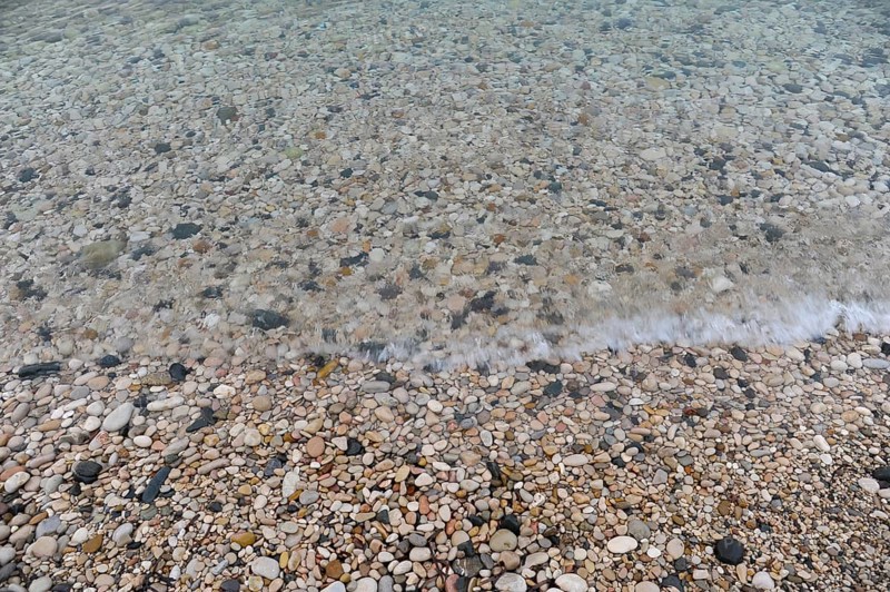 Pebbles on the beach of La Olla in Altea