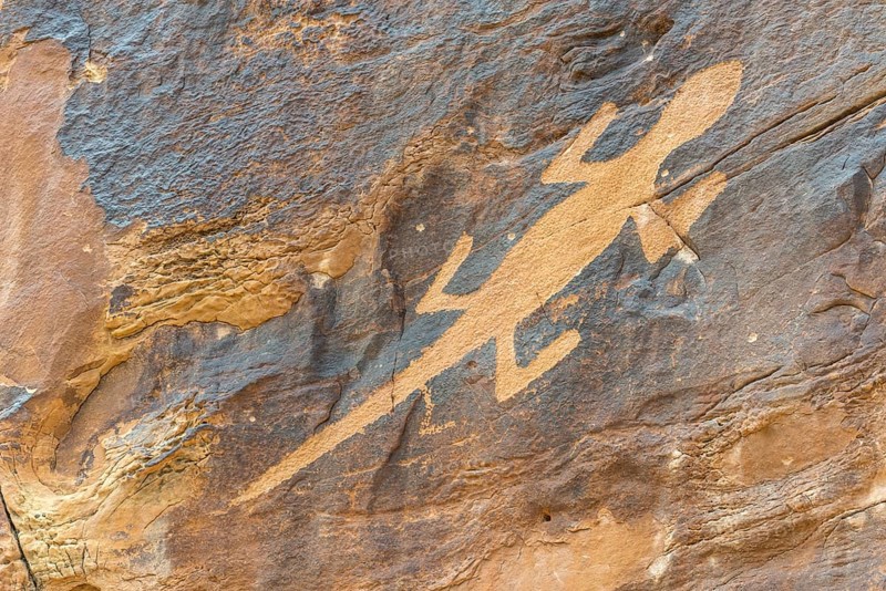 Petroglyphs on a rock wall at Cub Creek