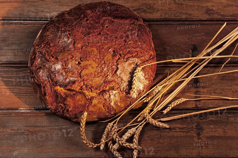 Freshly baked farmhouse bread with wheat ears