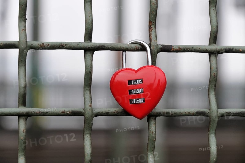 Red padlock in heart shape