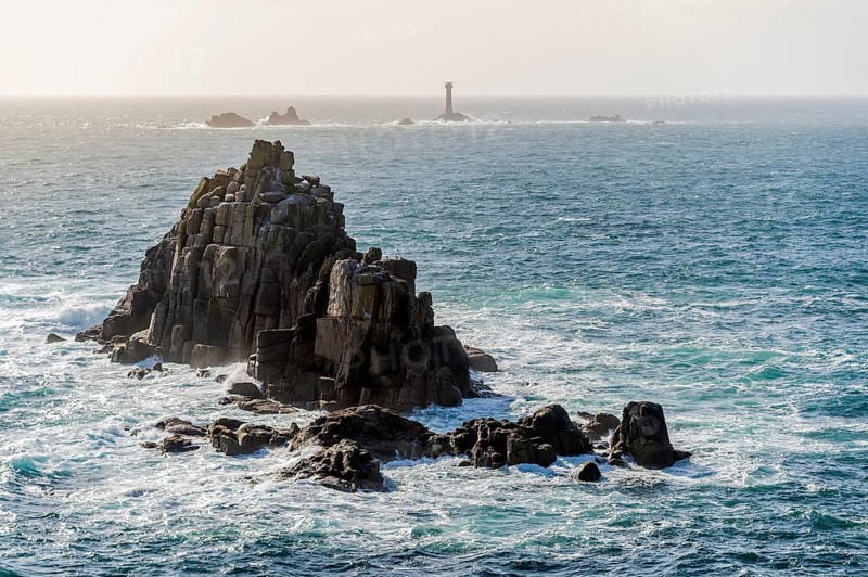 Armed Knight rocks and Wolf Rock Lighthouse behind