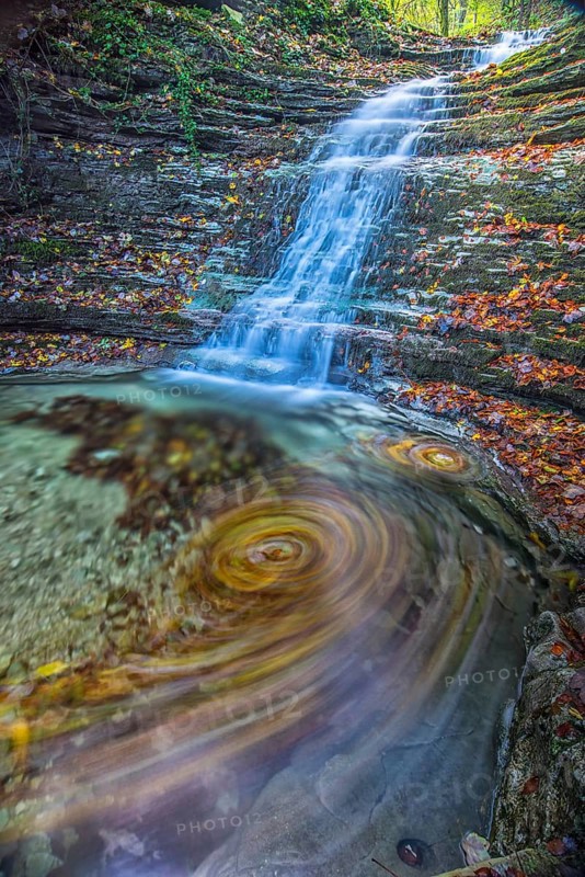 Waterfall in the forest in autumn