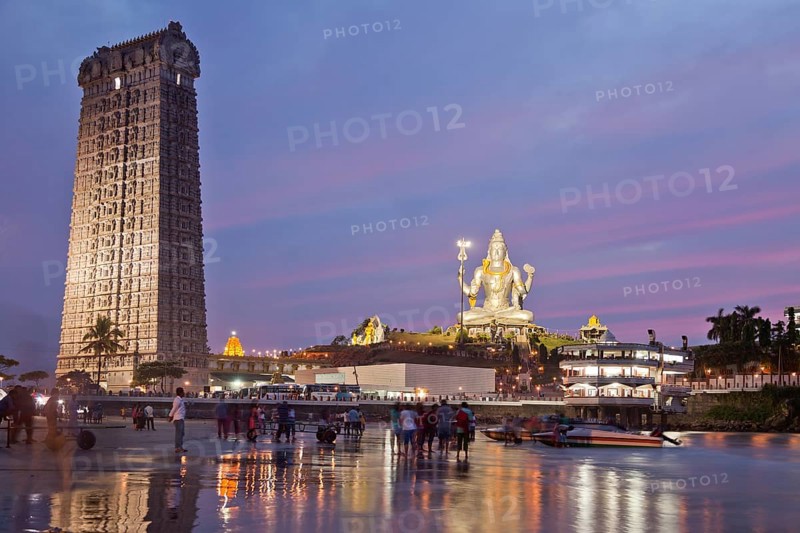 Giant statue of Lord Shiva and a Gopura tower