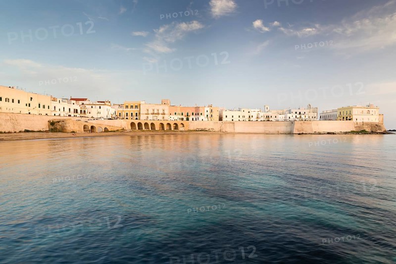 Town beach and historic centre in the evening light