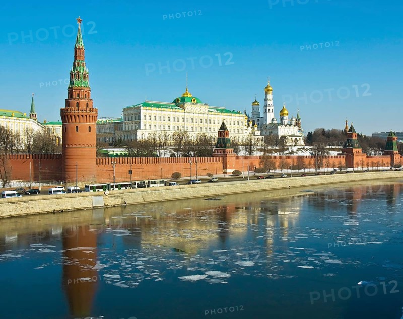 Moscow Kremlin with palace and cathedrals on bank of Moskva River in spring