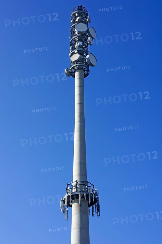 Transmission tower against a blue sky
