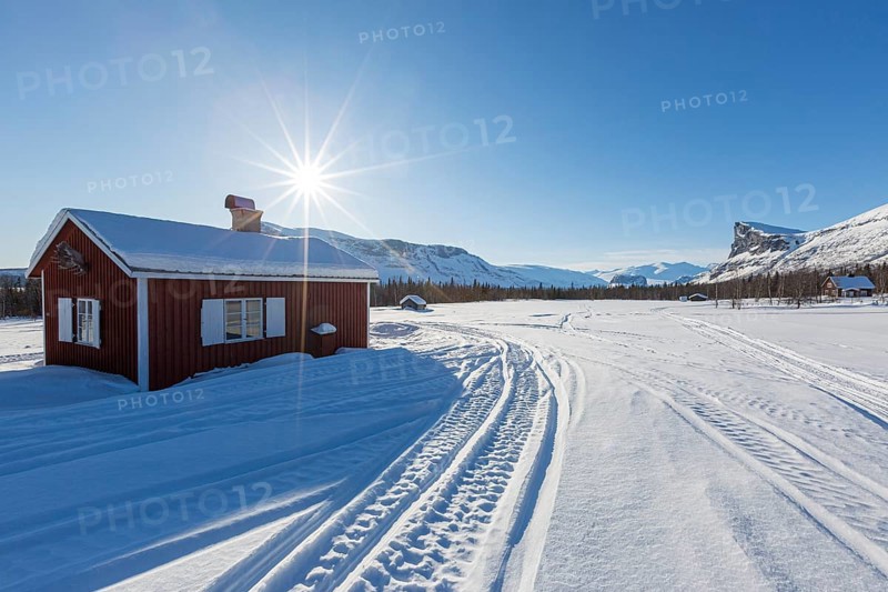 Wooden huts STF Aktse Fjallstuga in winter