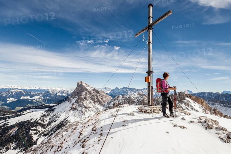 Mountaineer on the summit of Mt Tullen