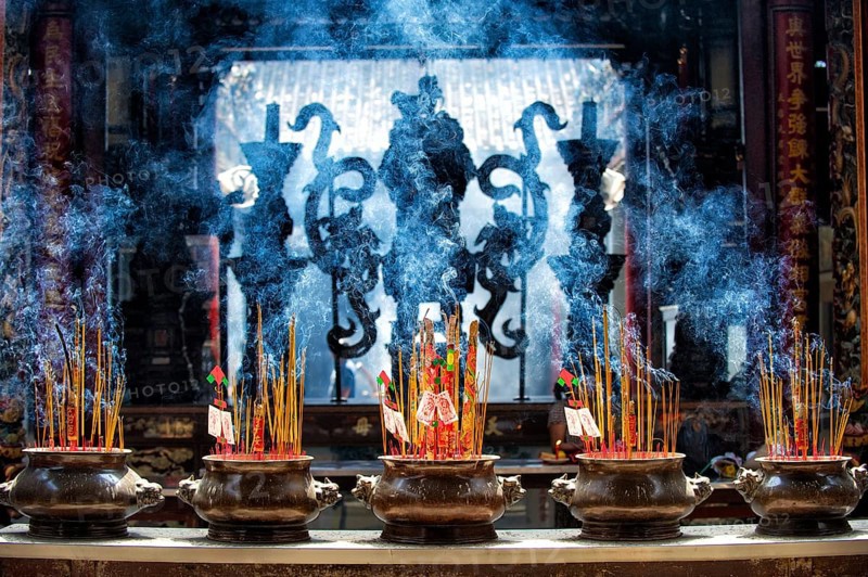 Incense sticks and incense coils in a temple