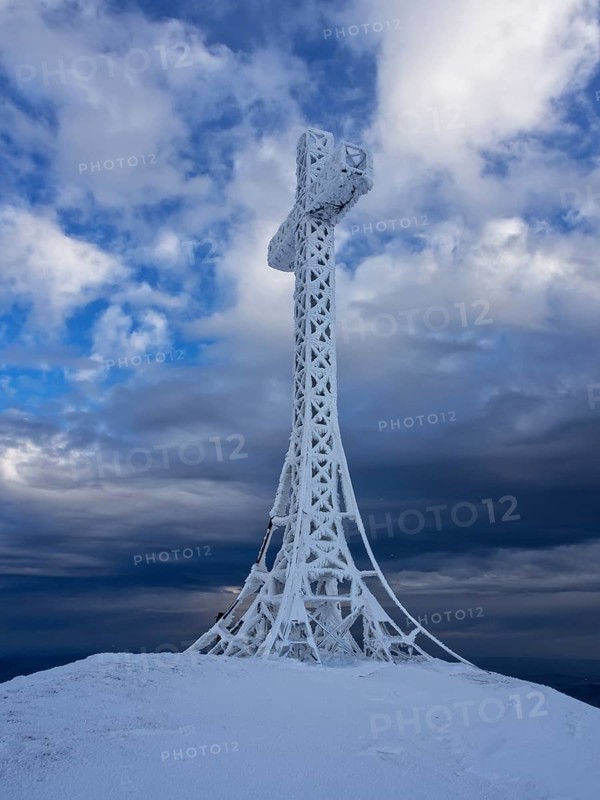 Summit cross covered with hoarfrost