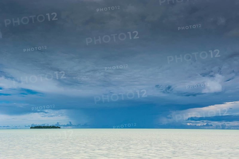 Dramatic sky above an islet