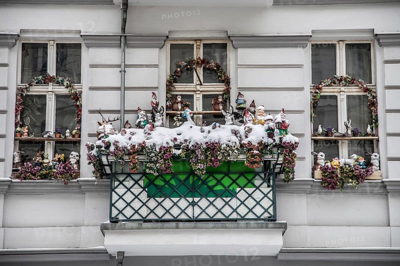 Christmas kitsch and knickknacks at a window