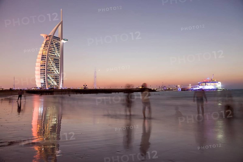 Luxury hotel Burj Al Arab and Jumeirah Beach at the blue hour