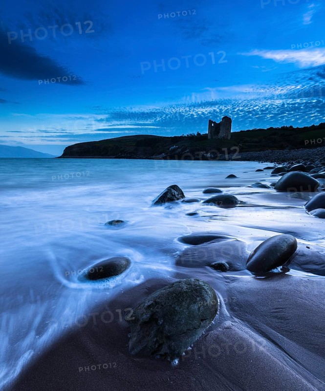 Round stones on Minard Beach