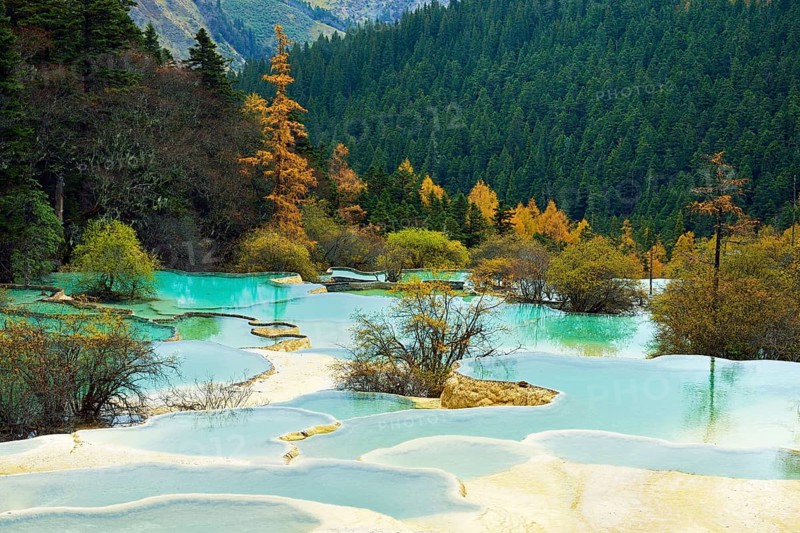 Lime terraces with lakes in autumnal environment