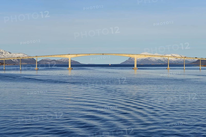 Sortland Bridge over wavy blue waters of Sortlandssundet strait