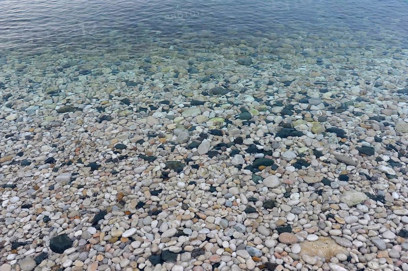 Pebbles on the beach of La Olla in Altea
