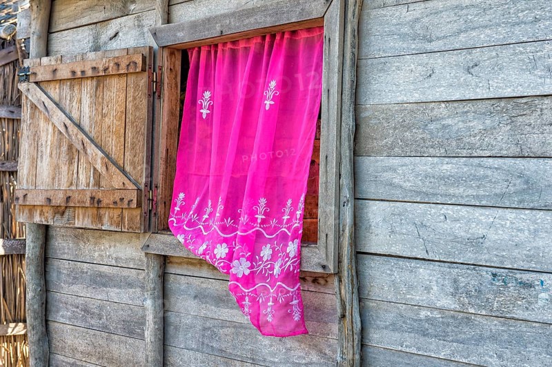 Typical house with pink curtain
