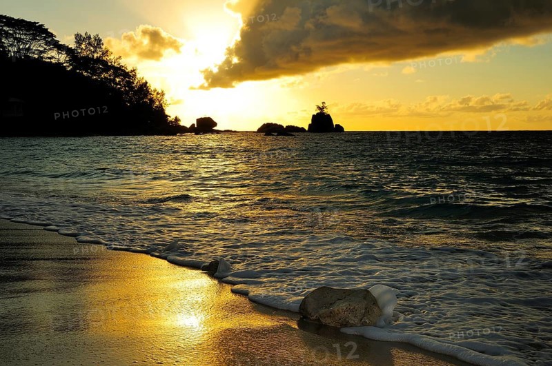 Sunset on the beach of Anse Soleil