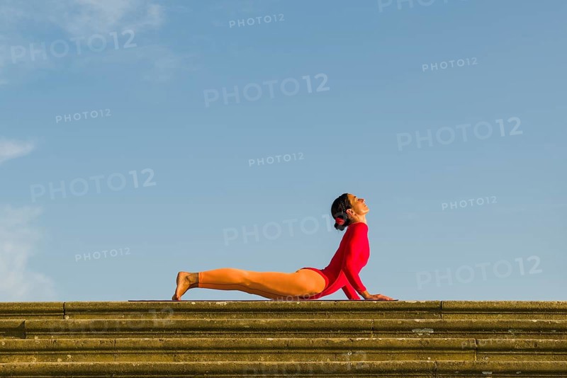 Young woman practising Hatha yoga