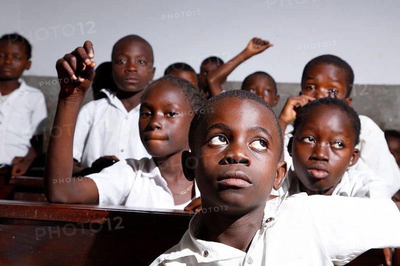 School children in school uniform during class