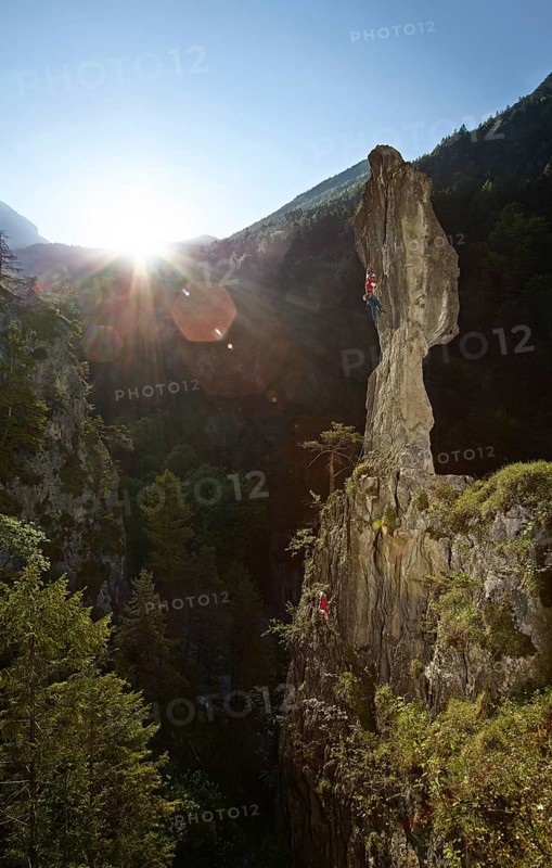 Sport climbers climbing a pinnacle