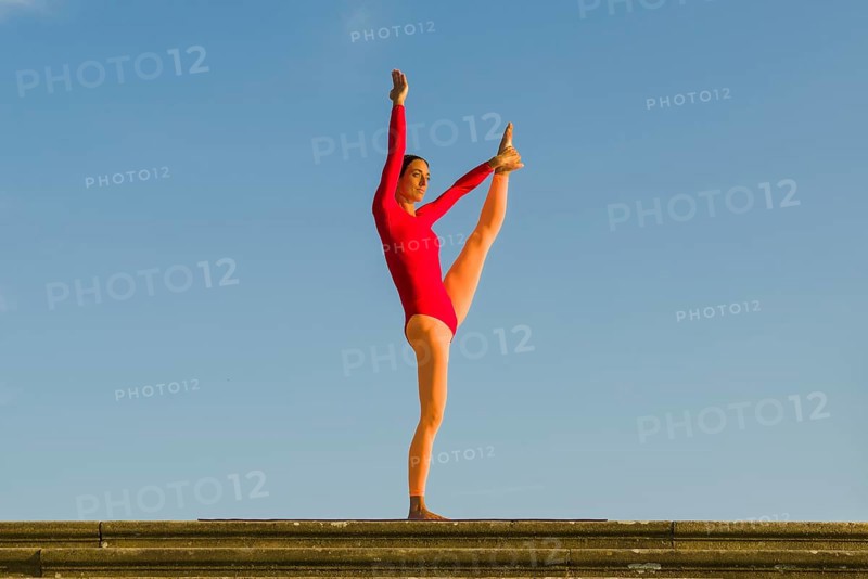 Young woman practising Hatha yoga